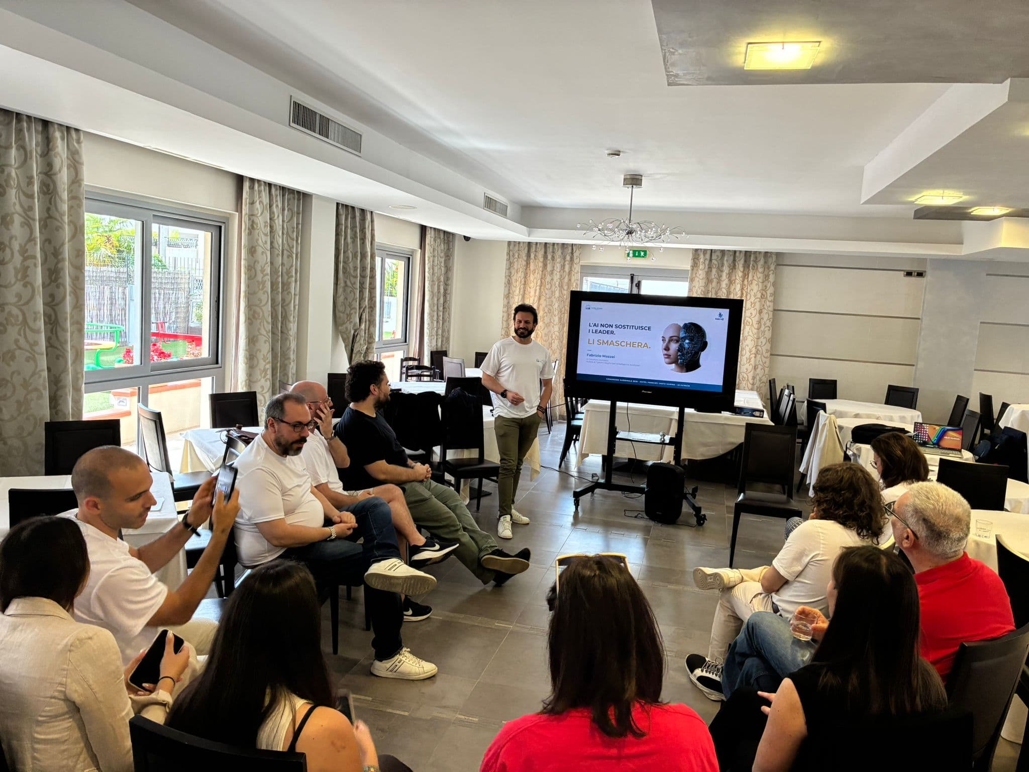 Fabrizio Mazzei giving a talk on AI and leadership at an event